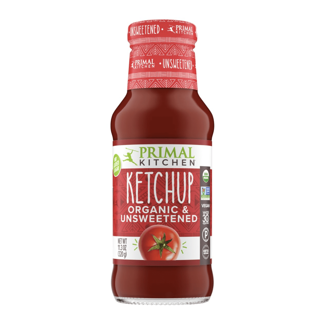 red ketchup bottle on white background